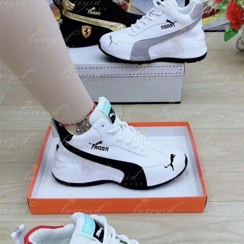 ZAPATILLAS BLANCAS Y NEGRA 2